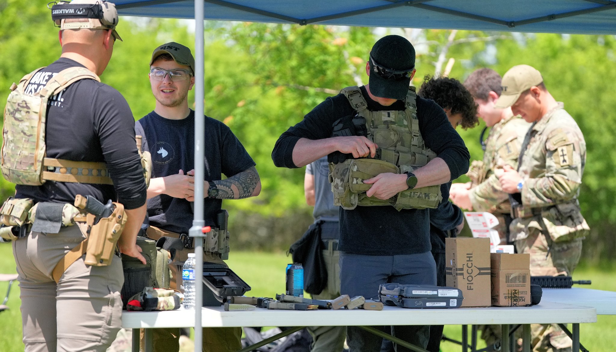 Tactical gear prep — outdoor training event